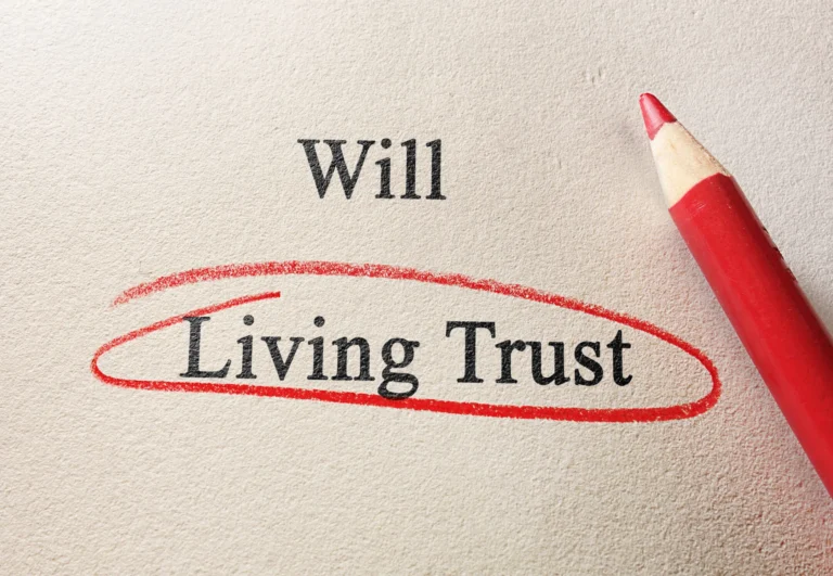 The words “Will” and “Living Trust” printed on paper, with “Living Trust” circled in red pencil.
