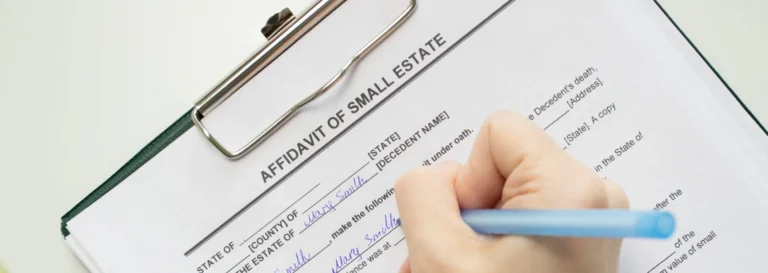 Person filling out an “Affidavit of Small Estate” form